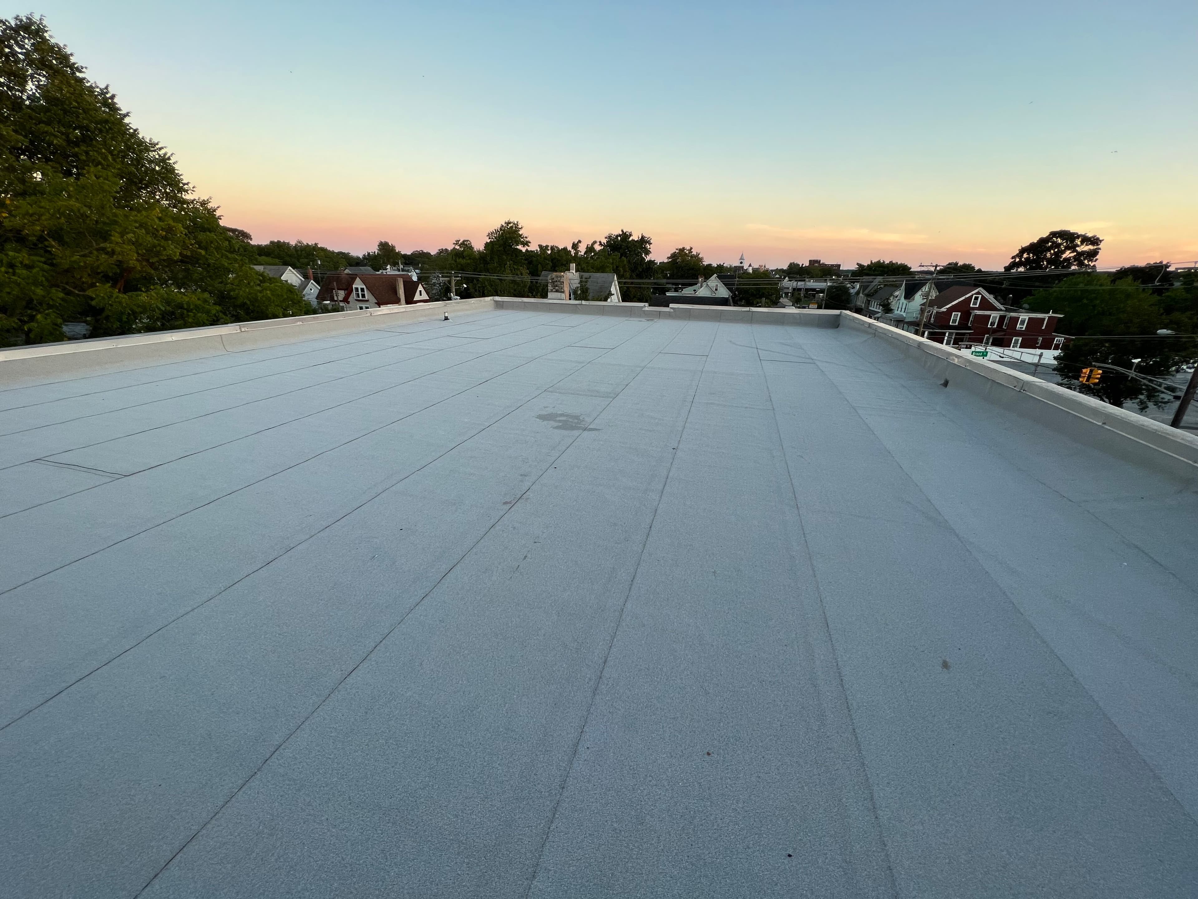 Completed commercial flat roof system