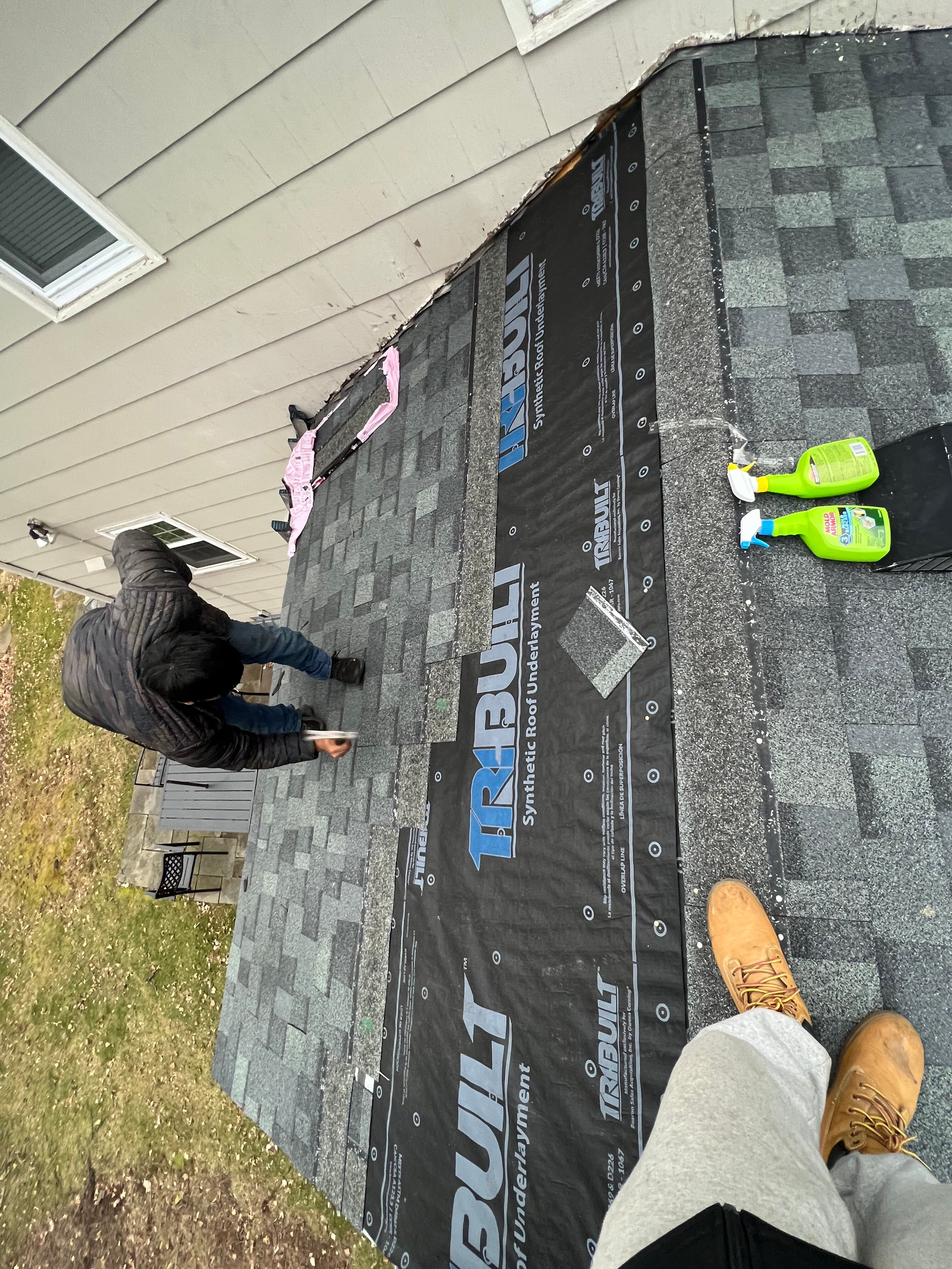 New asphalt shingles being installed on NJ home